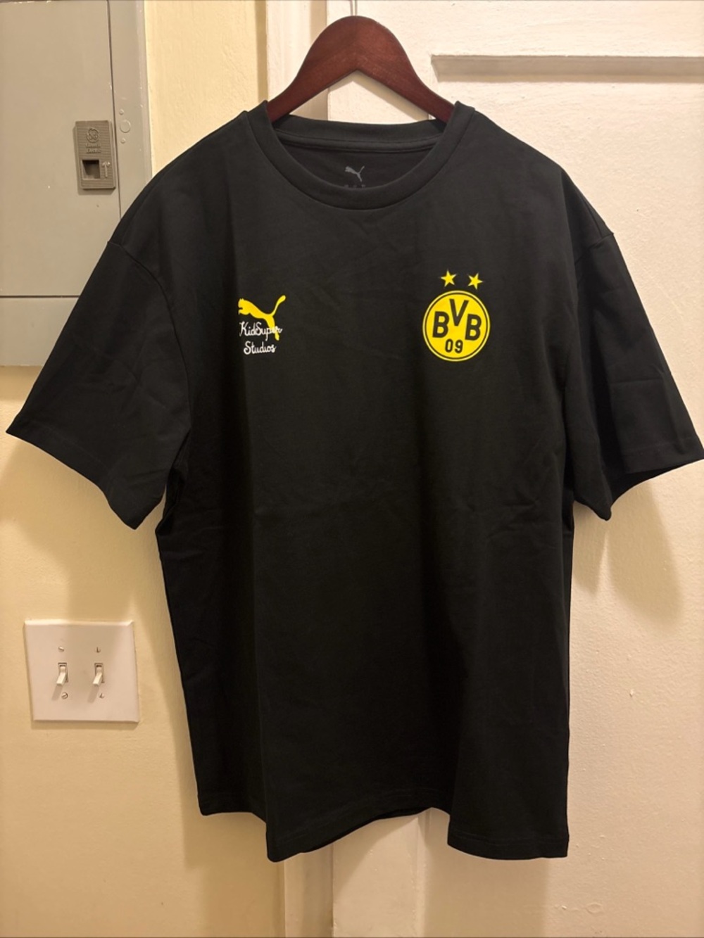 Men’s Kidsuper Puma x BVB Black Crew Tee with Yellow Crest
